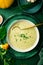 Tasty homemade zucchini and potato cream soup with herbs