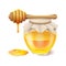 Tasty honey in glass jar with honey dipper