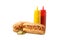 Tasty hot dogs, mustard and ketchup isolated on background