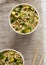 Tasty instant ramen noodles with beef flavoring in paper cups. Flat lay, from above, overhead. Close-up