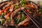 Tasty Korean bulgogi beef with carrot and onion macro. horizonta