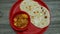 Tasty kulchas and paneer sabzi with lots of butter