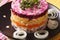 Tasty layered herring salad with vegetables and mayonnaise close