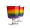 Tasty layered jelly dessert in glasses on white