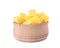 Tasty mango cubes in wooden bowl isolated