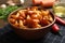 Tasty marinated mushrooms in bowl on table, closeup