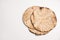 Tasty matzos on white background, top view. Passover Pesach celebration