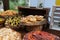 Tasty meals on a brown rustic wooden banquet table.