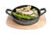 Tasty meat with asparagus and sprouts in portioned frying pan isolated