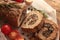 Tasty Meatloaf with mushrooms on wooden table