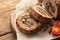 Tasty Meatloaf with mushrooms on wooden table