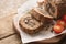 Tasty Meatloaf with mushrooms on wooden table