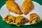 Tasty Mixed Spanish Empanadillas or spanish small pasties with a variety of fillings on a dish