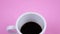 Tasty natural coffee on bright pink color background