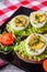 Tasty and nutritious avocado sandwich and boiled egg