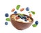 Tasty oatmeal with blueberries, yogurt and almond on background