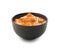 Tasty orange sauce in bowl on white background