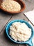 Tasty organic porridge in a blue bowl