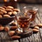 Tasty pairing Closeup of amaretto liqueur and almonds in shot glasses