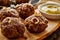 Tasty pan fried German meatballs with mustard