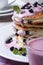 Tasty Pancake with blueberry sauce and milkshake vertical