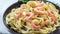 Tasty pasta with shrimps, Italian pasta fettuccine with grilled shrimps, bechamel sauce and thyme, Italian food, top view