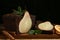 Tasty pear bread with mint, cinnamon and dried orange slices on table, closeup. Homemade cake