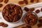 Tasty pecan nuts on wooden table, above view