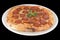 Tasty pizza salami with tomato sauce, salam, cheese and fresh basil, on a white plate