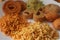 Tasty Plate With Ladoo Chakali Sev and Chivda. Indian Traditional Snacks. Closeup. Food Photography