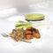 Tasty portion of Chinese rice with pieces of breaded chicken; photo on white background