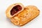 Tasty puff pastry dessert cut in half . Delicious pastries with fruit jam on light background. berry, strawberries or