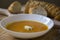 Tasty pumpkin soup with horseradish and fresh multigrain baguette