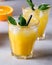 Tasty and Refreshing Orange Juice in Glasses with Black Straws on Light Gray Background Fresh Ripe Oranges Vitamin or Detox Drink