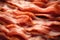 Tasty roasted bacon background. Texture of sliced of bacon