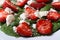 Tasty salad of strawberries, spinach, goat cheese and sesame