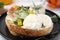 Tasty sandwich with burrata cheese and vegetables on table, closeup