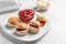 Tasty scones with clotted cream and jam