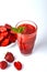 Tasty strawberry smoothie on white background. Fresh strawberry smoothie, summer drink, healthy antioxidant juice with