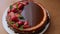 Tasty strawberry tart decorated with mint leaves on wooden table. Caramel glaze on top of tart. Vegan breakfast. Lactose