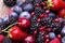 Tasty summer fruits on a wooden table