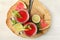 Tasty summer watermelon drink, limes and mint on white wooden table, top view