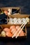 Tasty sushi rolls in disposable kraft paper boxes, sauces, chopsticks. Sushi for take away or delivery