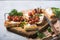 Tasty tapas, snack or crostini or Bruschetta with toasted baguette, roasted tomatoes. Delicious breakfast, snack, appetizers