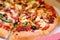 Tasty vegetable pizza close-up, selective focus