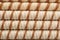 Tasty wafer roll sticks as background, top view.