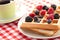 Tasty waffle with fruits