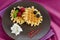 Tasty waffle with fruits