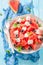 Tasty watermelon salad with feta, olives and mint leaves