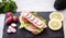 Tasty wholemeal sandwich with roasted turkey with lettuce, tomato and radishes. Ideal for a snack or a light and dietetic lunch